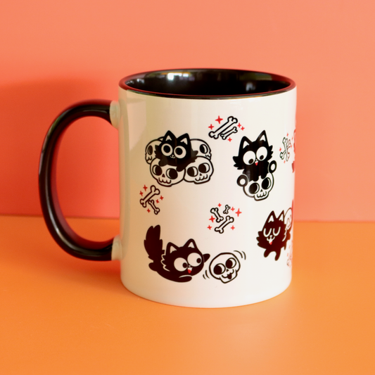 Playful Skull Cats Ceramic Mug